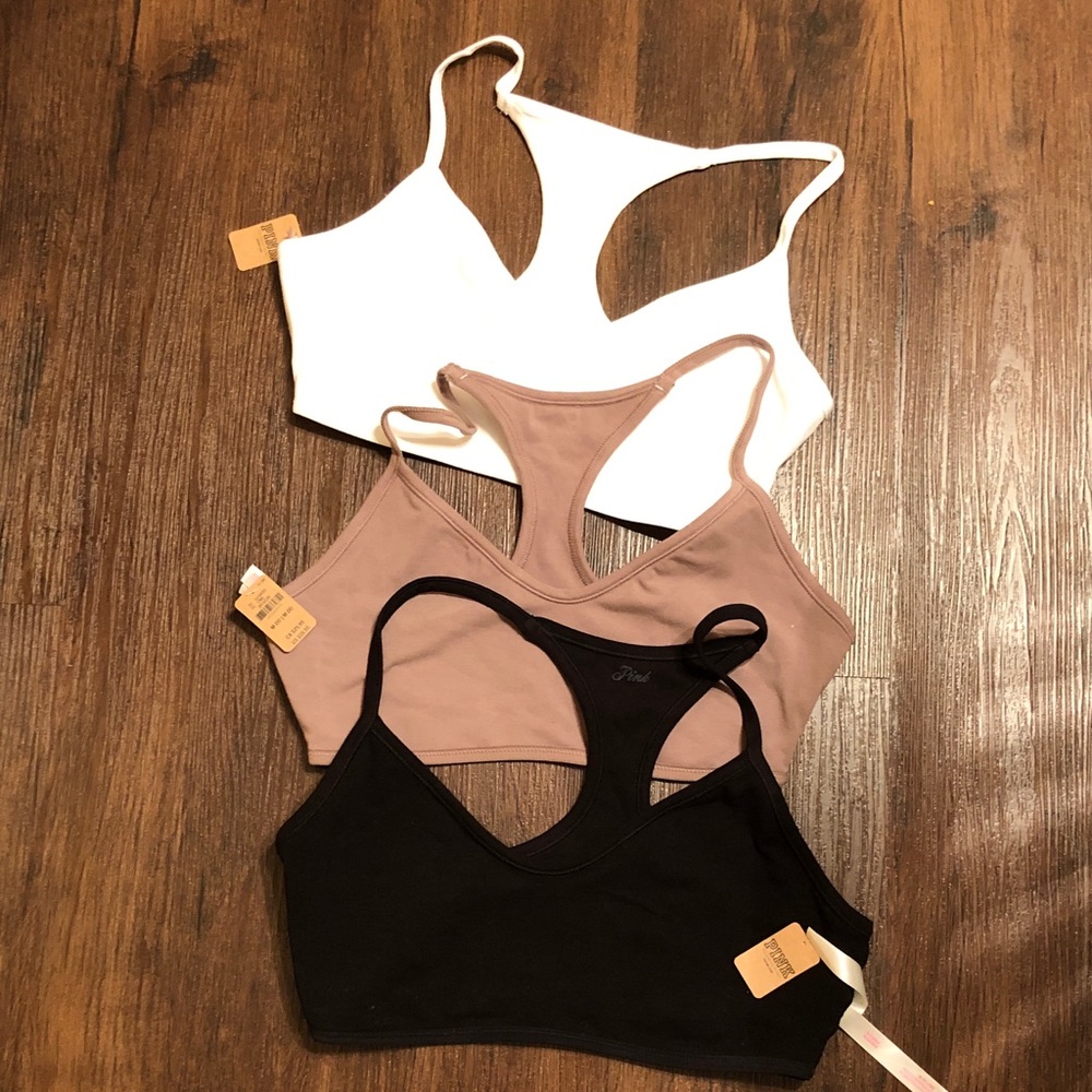 Stylish active sport bras set of 3 black white tan size M DD.